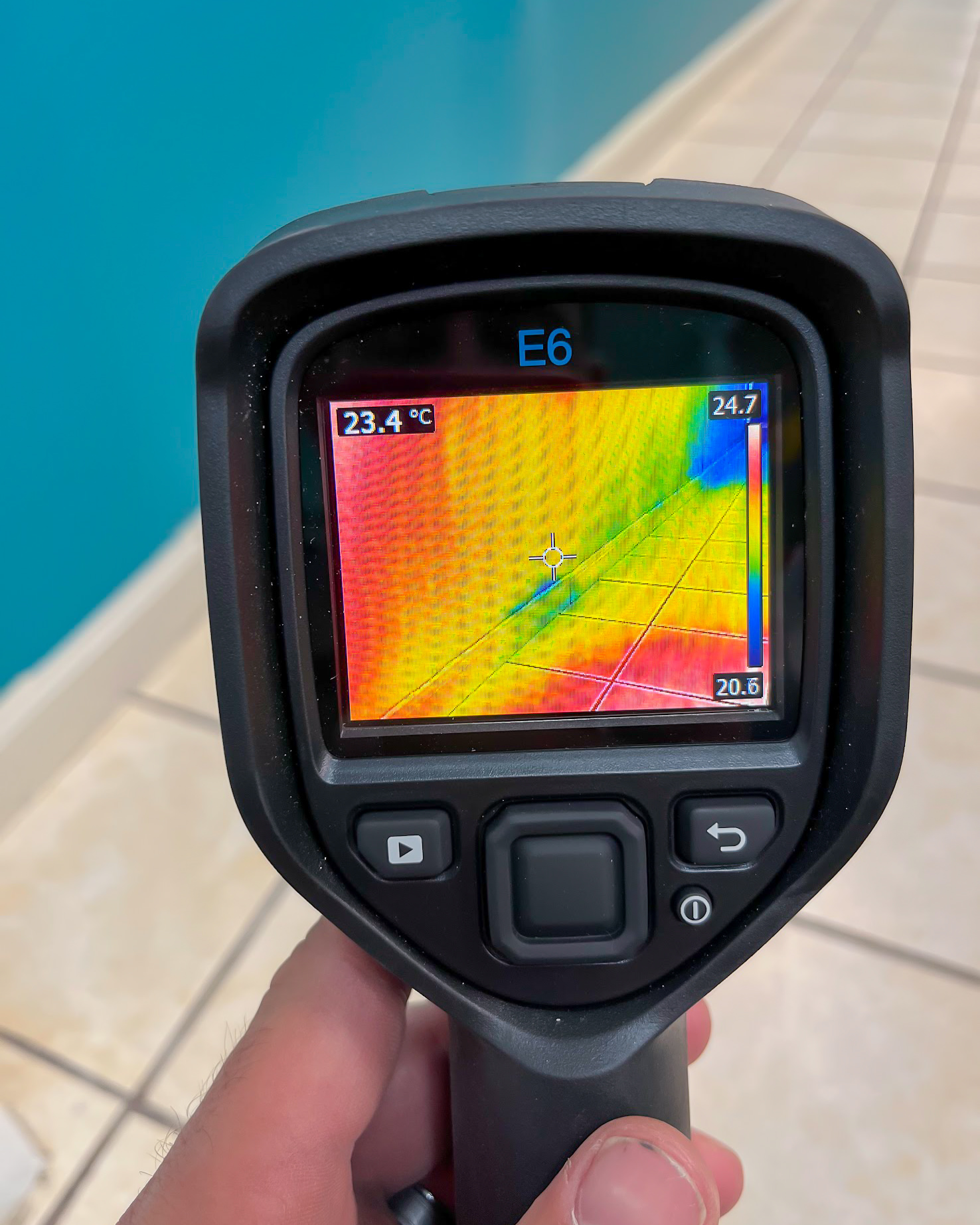 FLIR thermal imaging scan of water-damaged tile floor