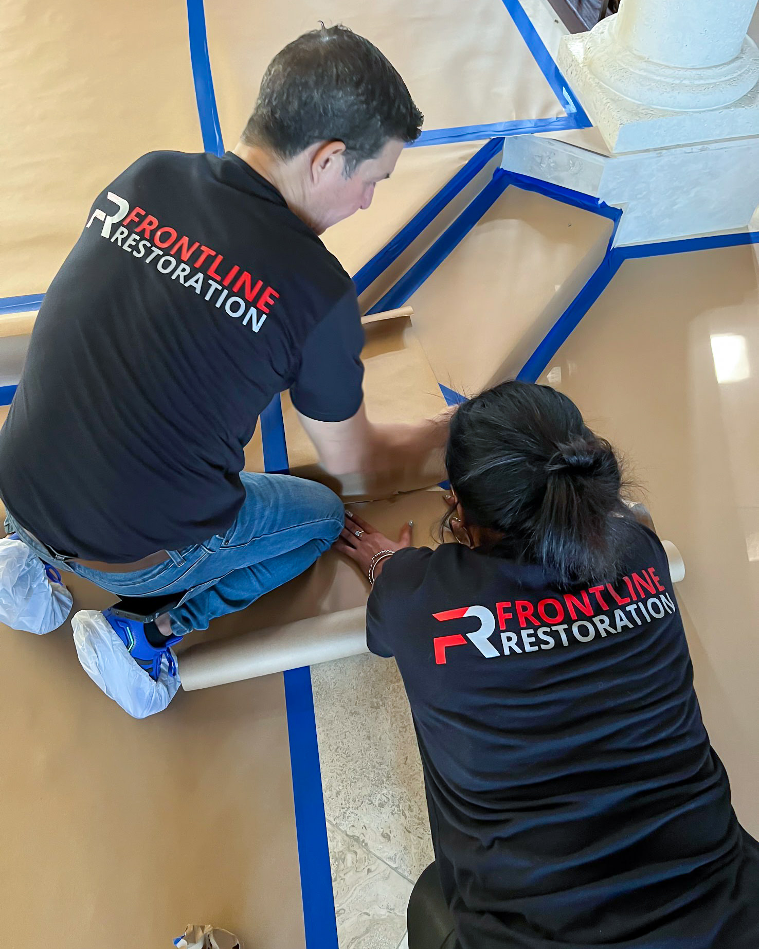 Frontline Restoration team performing water damage assessment