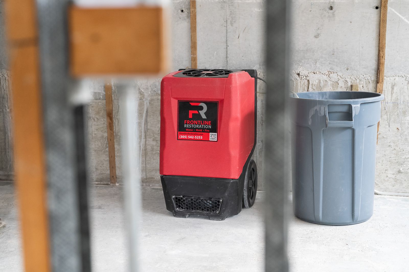 Drying equipment running against exposed wall studs after water removal