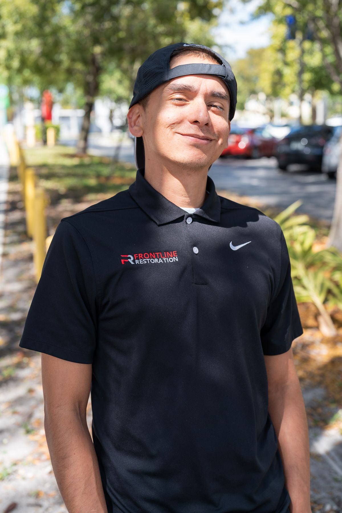 Technician standing outside a property before beginning an inspection